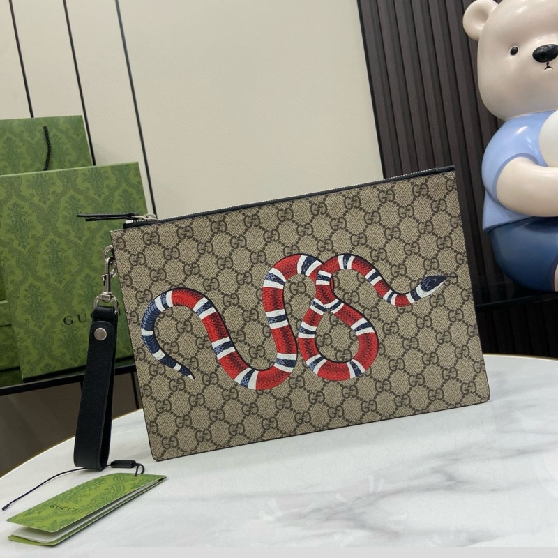 G*u*i clutch bags